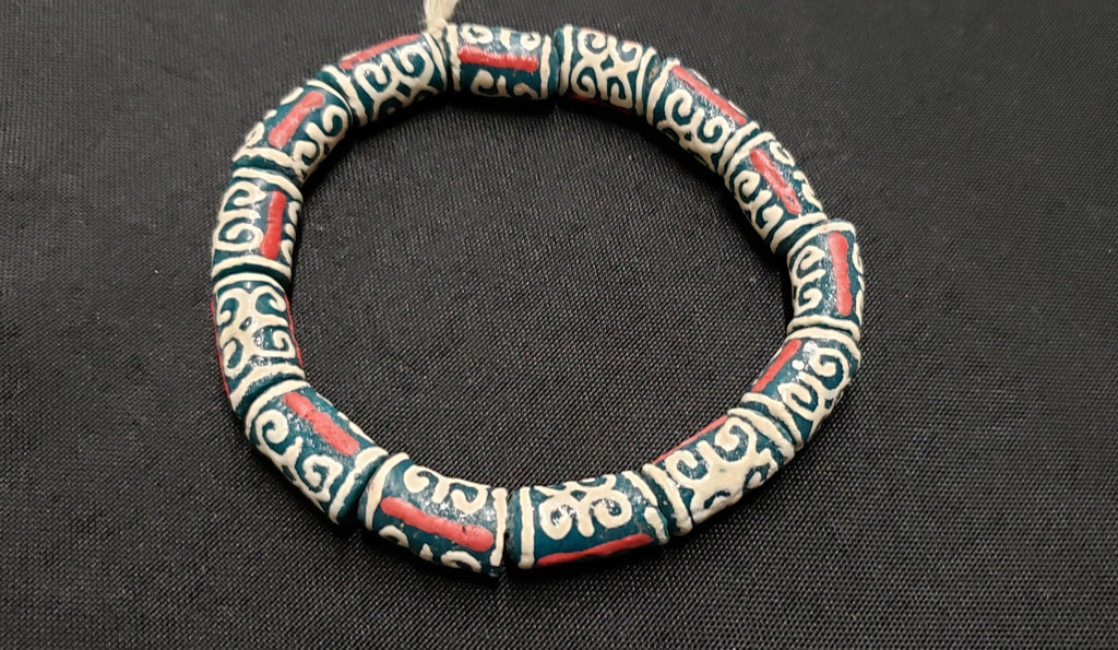 African Recycled Glass Beads Symbolizing Humility and Strength: Crafting with Meaning.