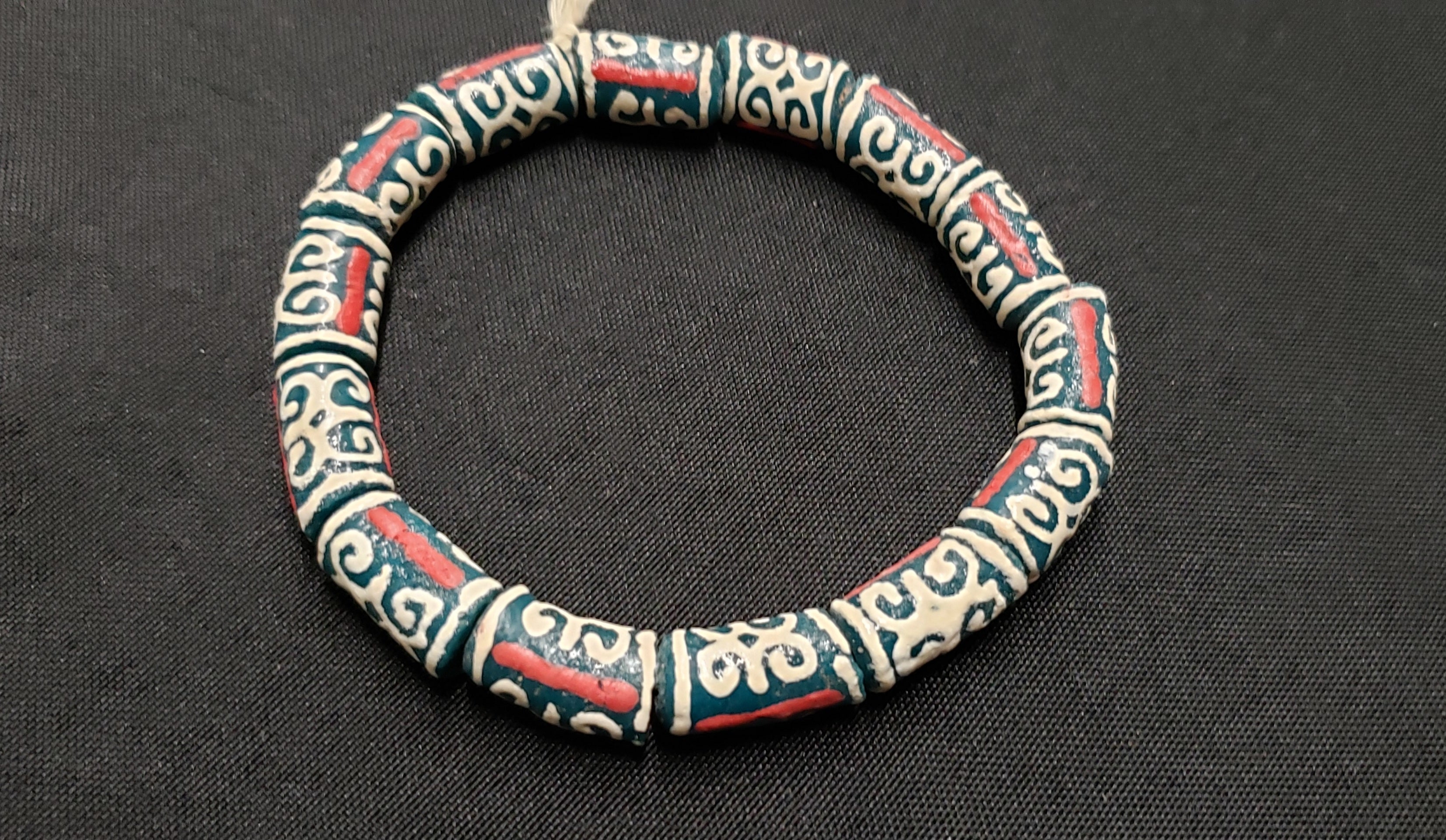 African Recycled Glass Beads Symbolizing Humility and Strength: Crafting with Meaning.