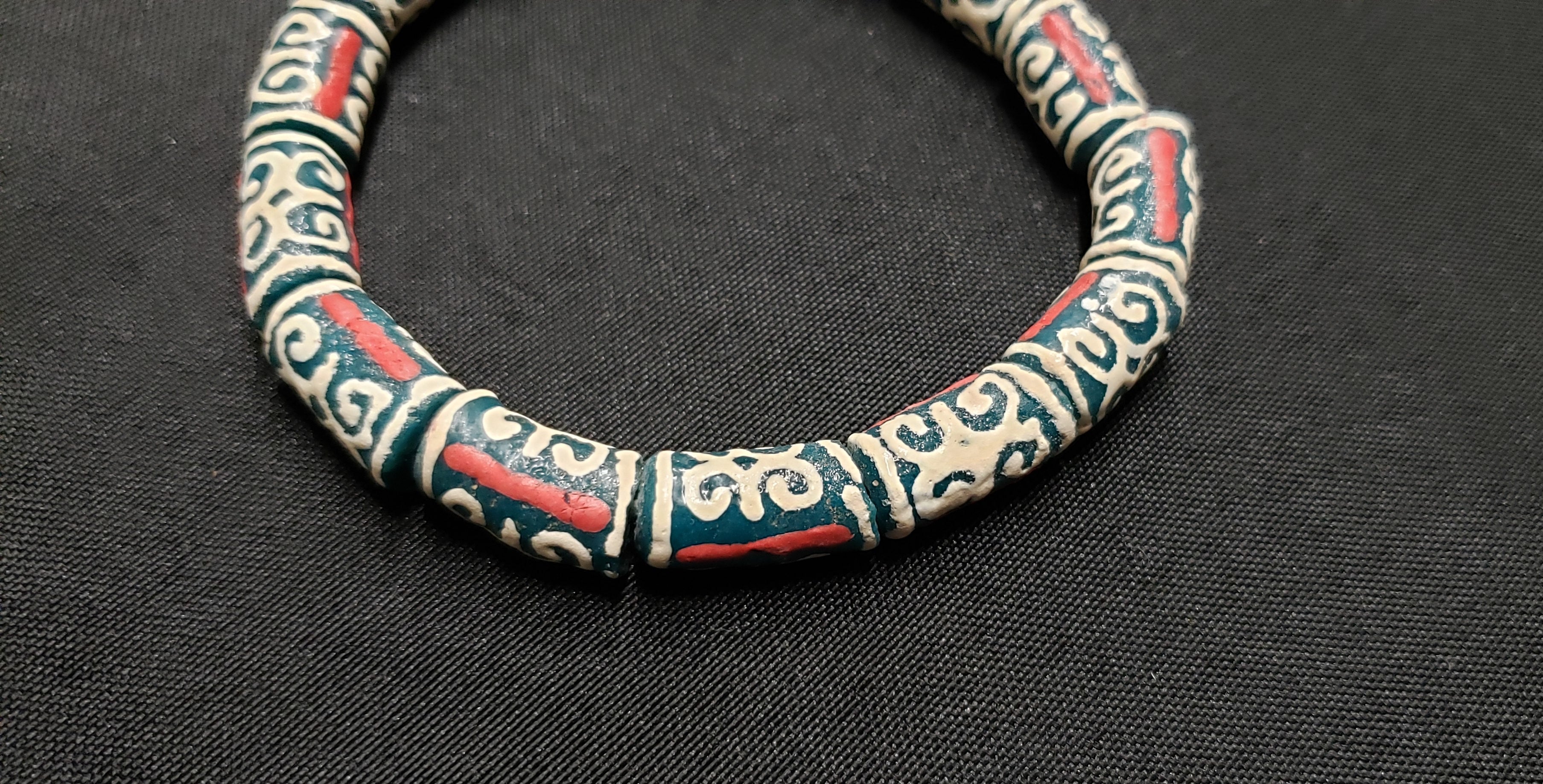 African Recycled Glass Beads Symbolizing Humility and Strength: Crafting with Meaning.