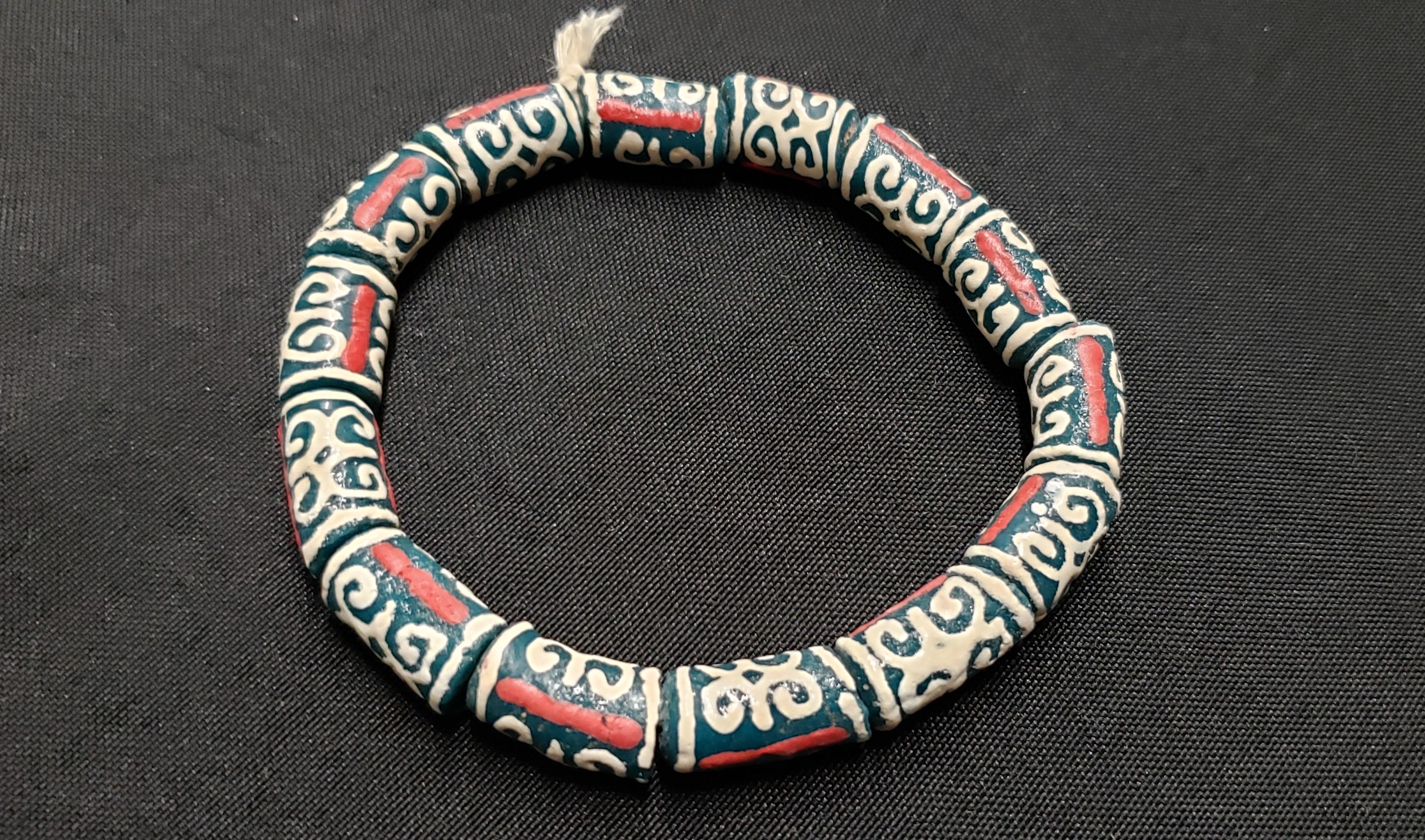 African Recycled Glass Beads Symbolizing Humility and Strength: Crafting with Meaning.