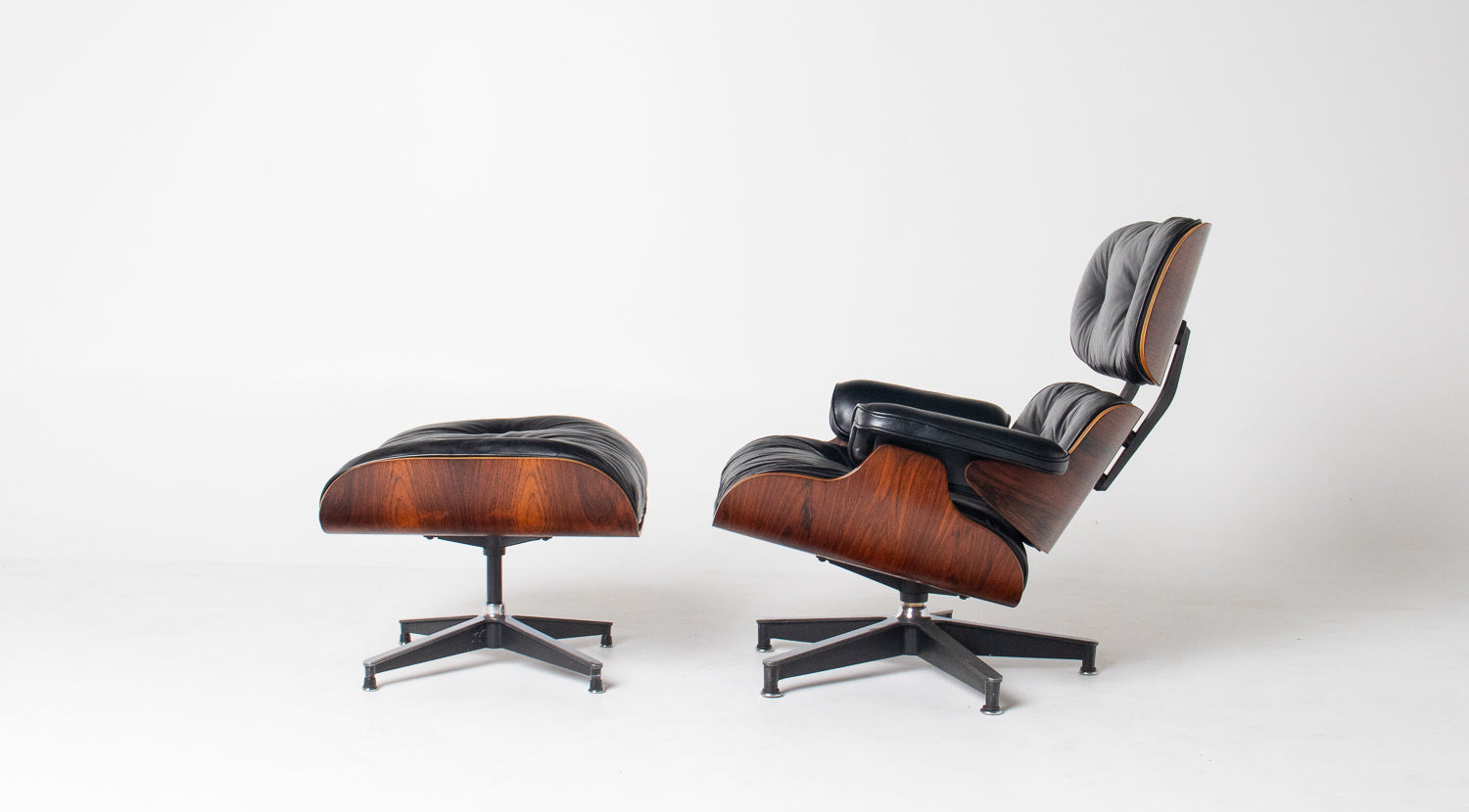 Early 1st Generation Eames Lounge Chair and Ottoman in Brazilian Rosewood finished in Gunstock Oil by Herman Miller