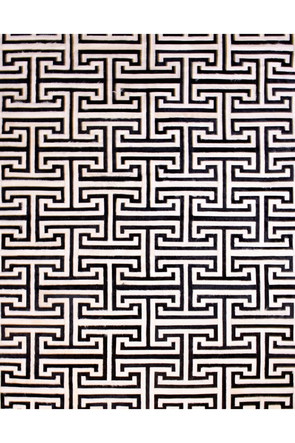 T MODEL – Maze-Inspired Cowhide Patch Rug