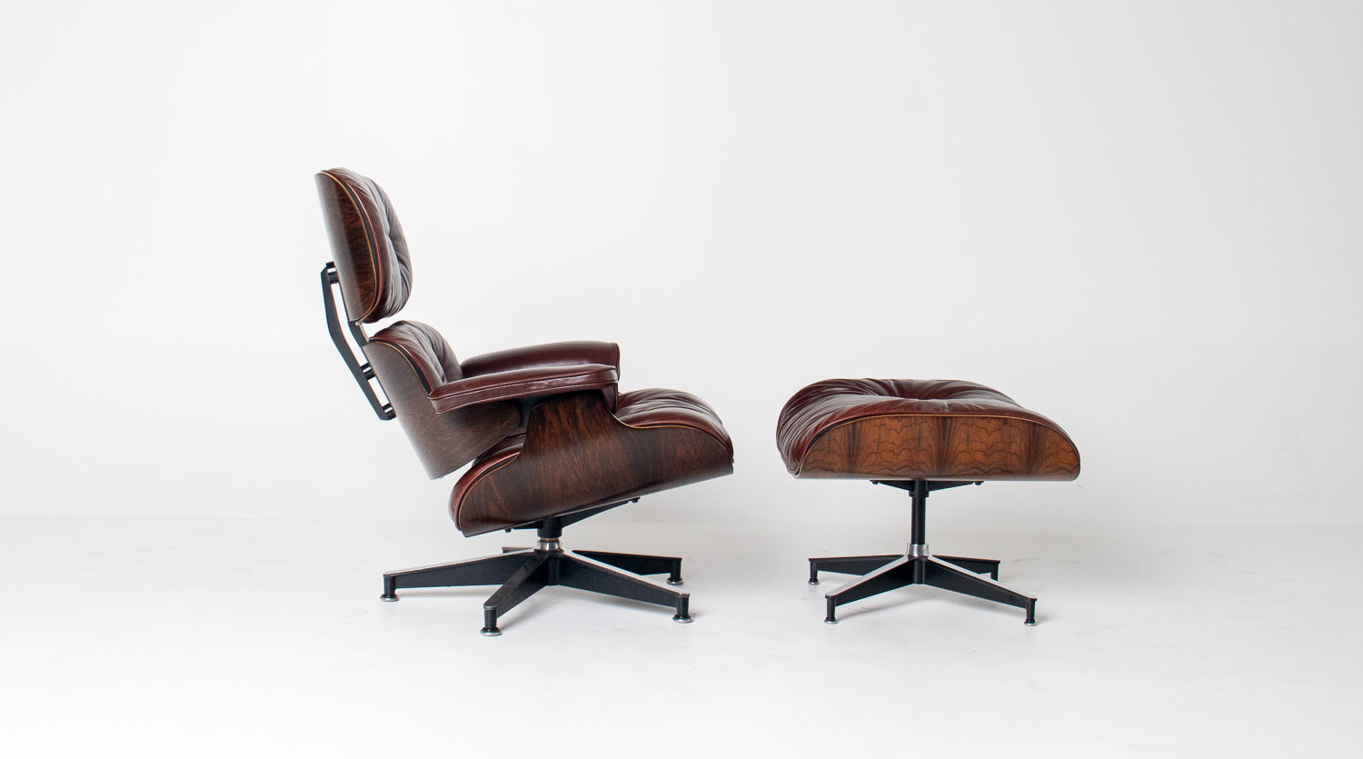 3rd Generation Eames Lounge Chair in Brazilian Rosewood and Oxblood Leather by Herman Miller