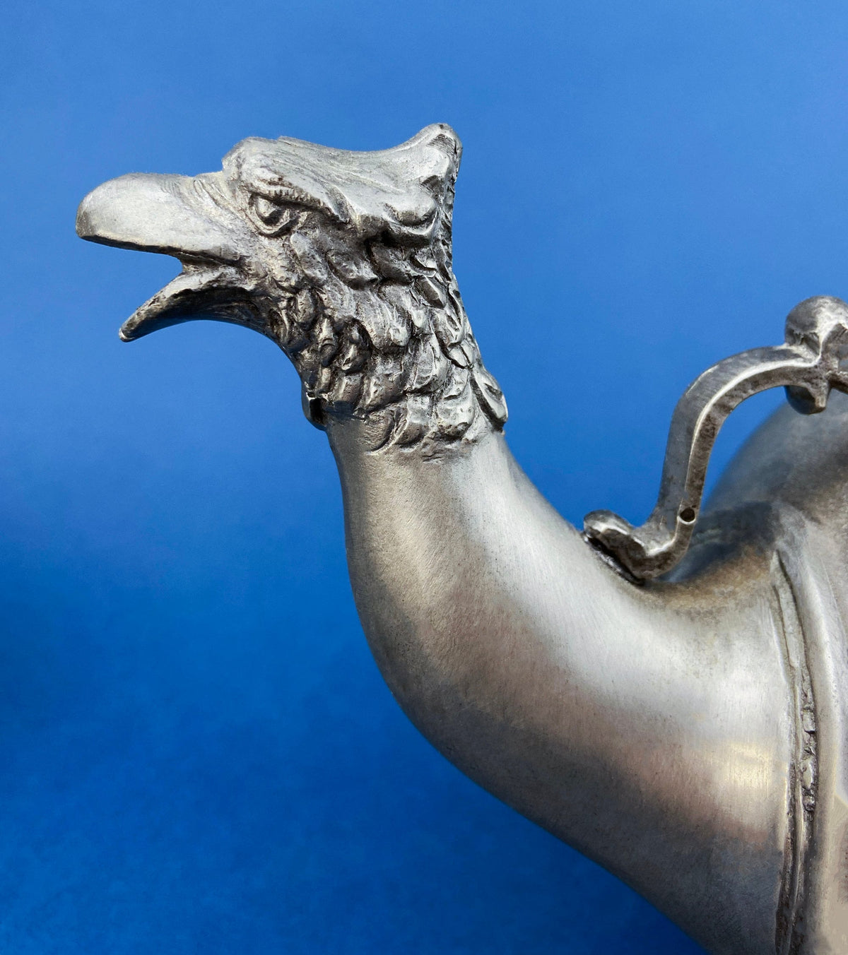 Pewter Teapot by Etain Zinn.  Etched with Heart and Cupids Antique Teapot. Spout Shaped like Eagle. Back Handle with Lion.
