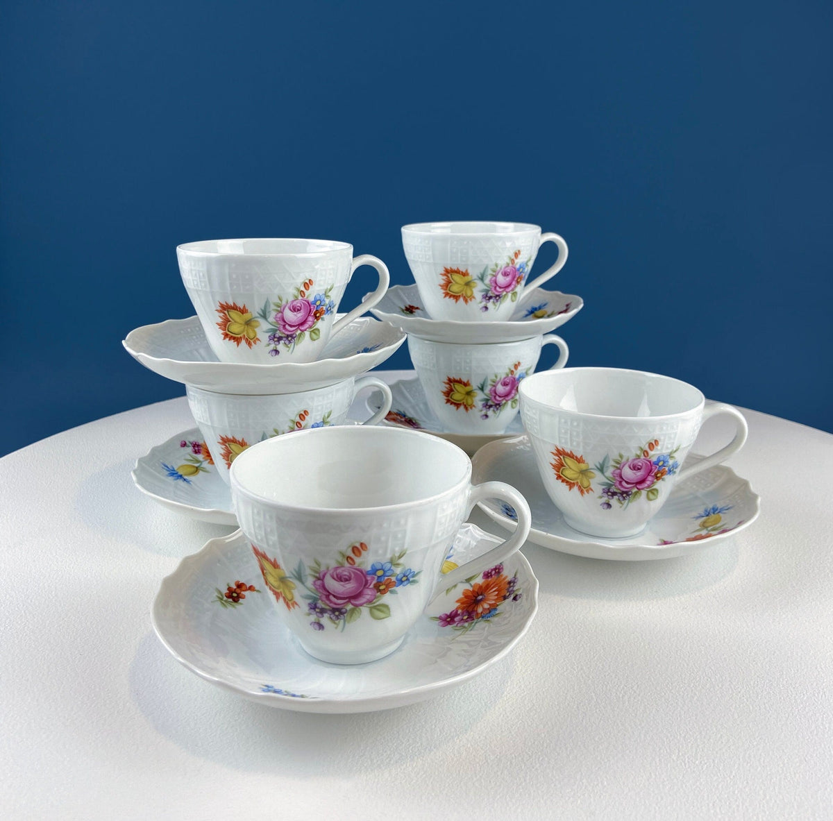 Antique Hutschenreuther Porcelain Coffee Set. Coffee or Teapot, Sugar Jar, Creamer, 2 8" Dessert Plates, & 6 Tea Cups/Saucers. Floral Motif.
